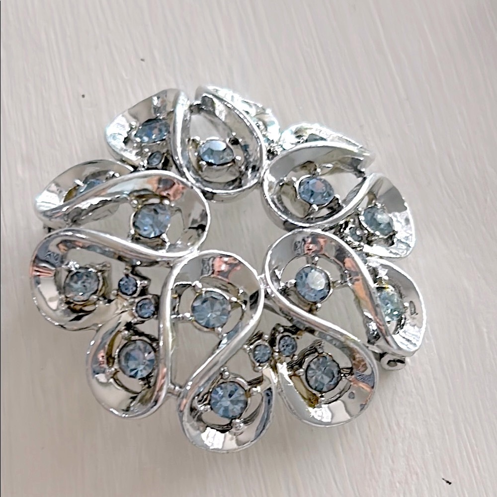 Vintage Coro silver toned with baby blue stones pin brooch